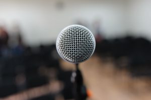 An empty microphone, that is public speaking.